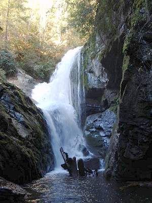 Waterfall on Lake Jocassee behind rock